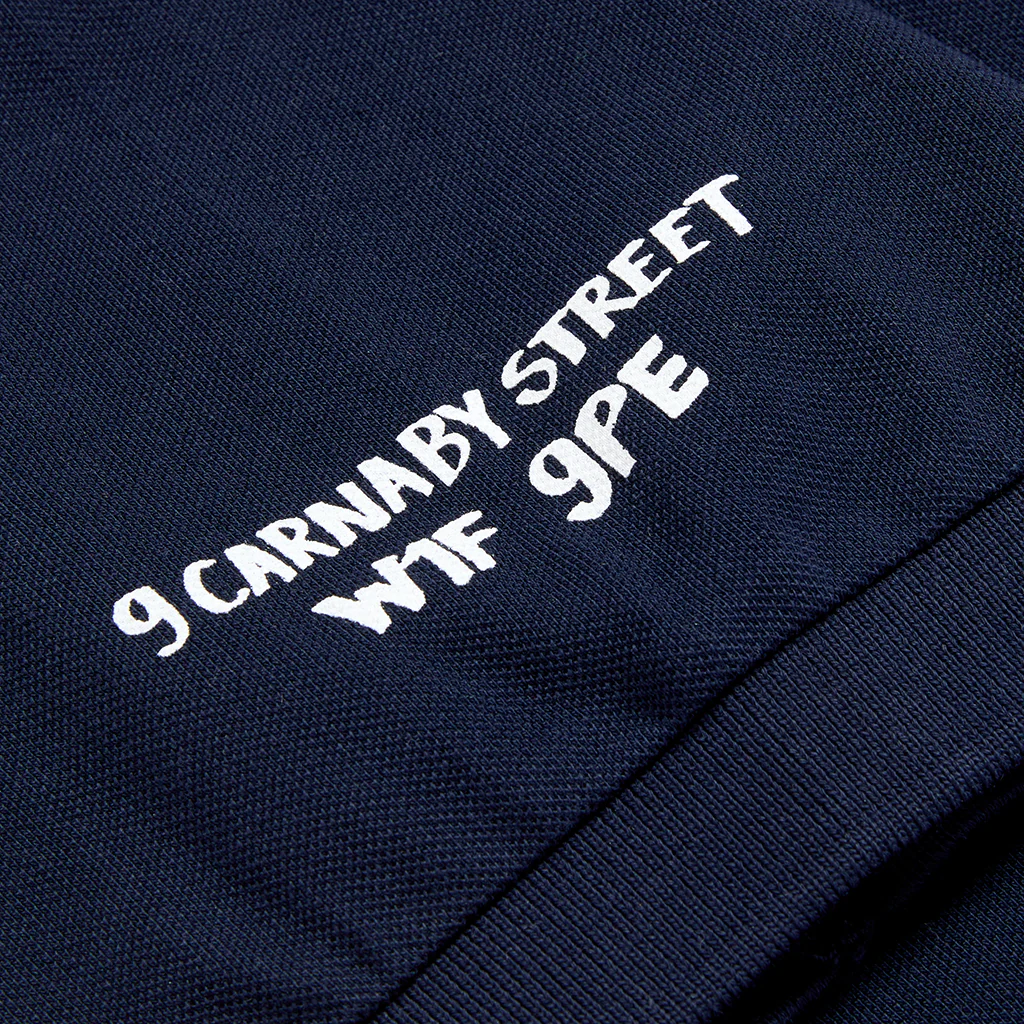 Scorching Stones Tongue Embroidered Navy Polo Shirt - Image 10