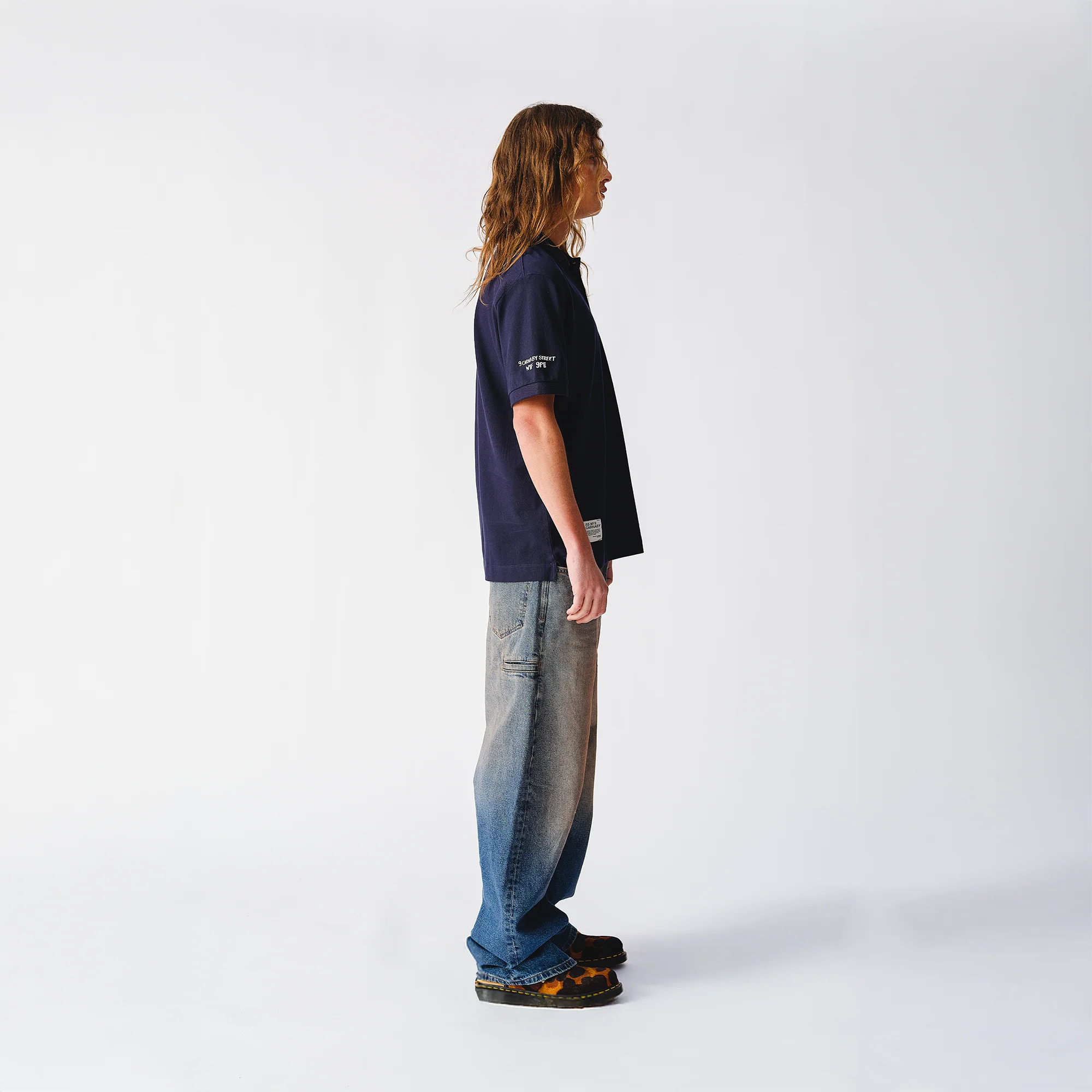 Scorching Stones Tongue Embroidered Navy Polo Shirt - Image 3